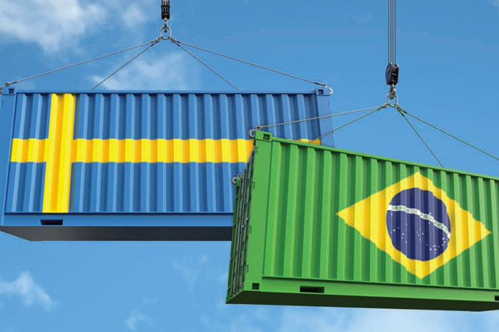 Två contrainar, en med svenska flaggan och en med brasialianska flaggan