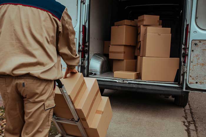 
Courier transporting packages in a car.